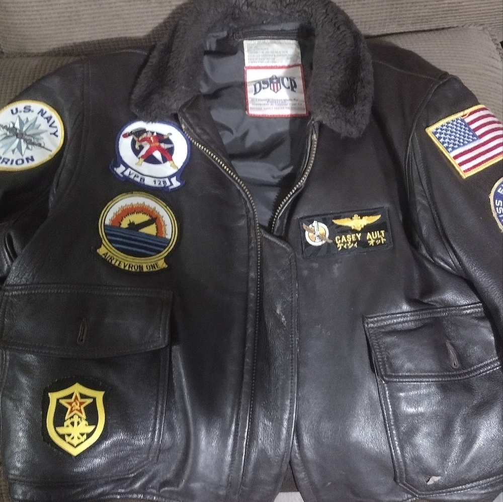 Authentic USN aviator jacket with very rare patches